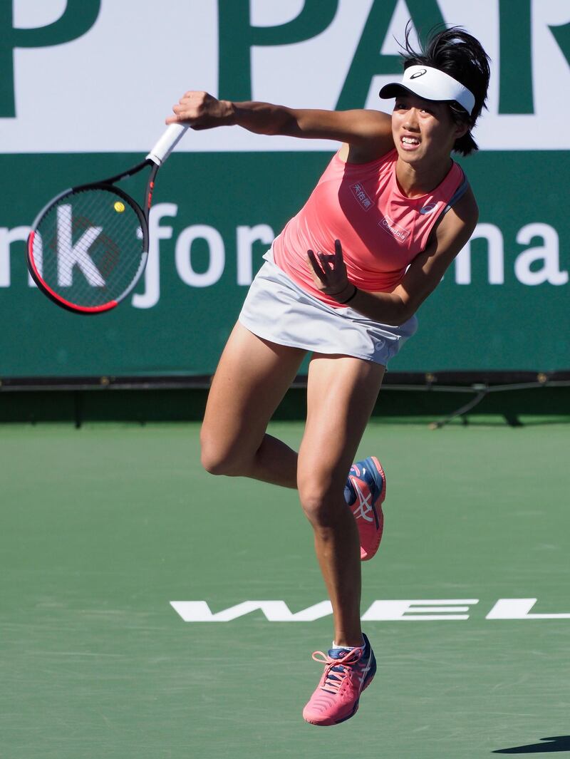 Shuai Zhang of China in action against Latvia's Jelena Ostapenko at Indian Wells. EPA