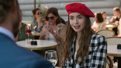 Lily Collins in a scene from the series 'Emily in Paris'. The programme was nominated for an Emmy Award for Outstanding Comedy Series. Netflix via AP