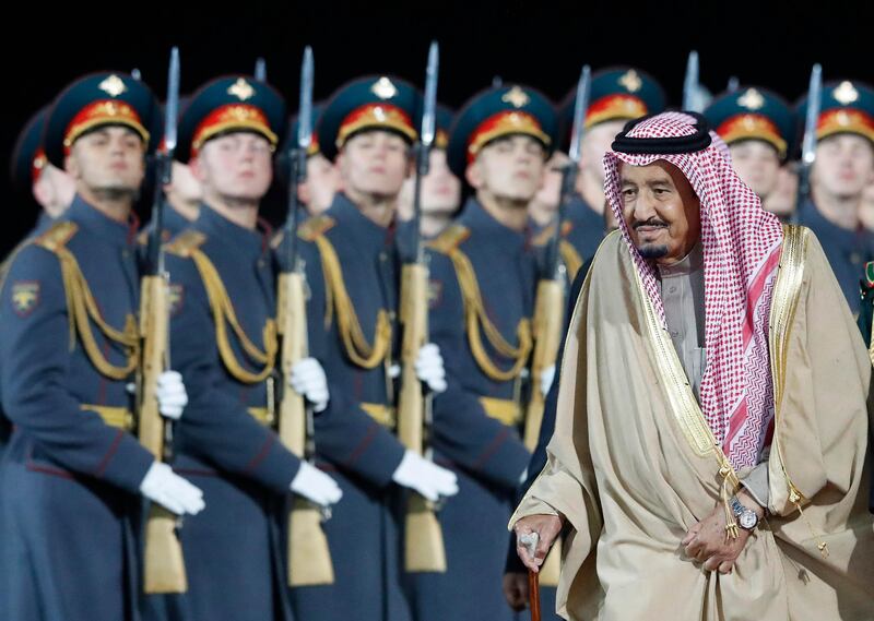 Saudi Arabia's King Salman walks past Russian honour guards during a welcoming ceremony upon his arrival at Vnukovo airport outside Moscow, Russia October 4, 2017. REUTERS/Sergei Karpukhin