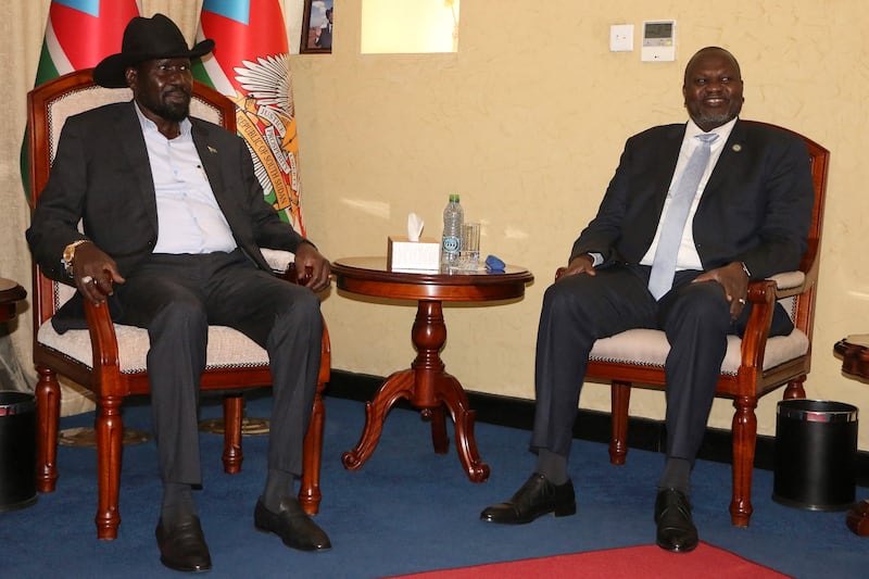 South Sudan President Salva Kiir and his deputy Riek Machar meet at the State House in Juba.  AFP