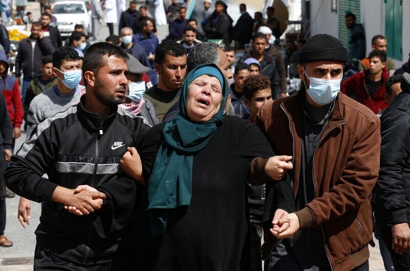 The mother of one of three fishermen killed when their boat exploded off Gaza's coast, reacts outside Nasser Hospital in Khan Yunis in the southern Gaza Strip. AFP