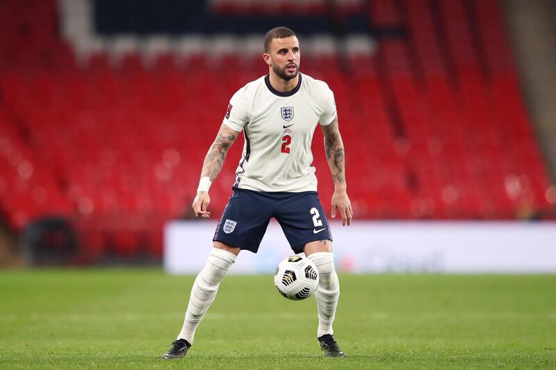 LONDON, ENGLAND - MARCH 31: Kyle Walker of England looks to pass the ball during the FIFA World Cup 2022 Qatar qualifying match between England and Poland on March 31, 2021 at Wembley Stadium in London, England. Sporting stadiums around the UK remain under strict restrictions due to the Coronavirus Pandemic as Government social distancing laws prohibit fans inside venues resulting in games being played behind closed doors. (Photo by Alex Pantling - The FA/The FA via Getty Images)