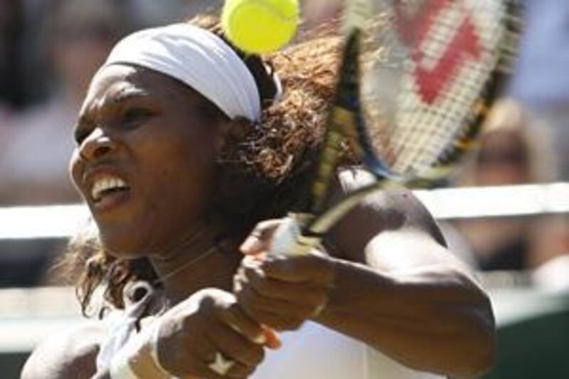 Serena Williams booked her place in round three with a crushing defeat of Jarmila Groth.
