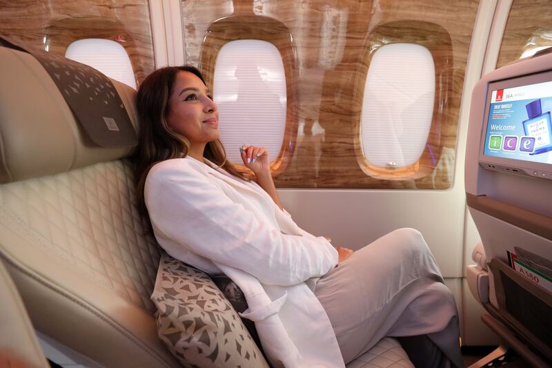 The wood panelling in premium economy is inspired by Emirates' business-class cabins.  