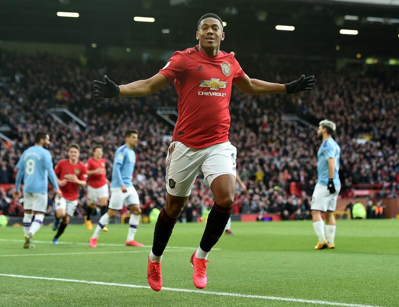 epa08278996 Anthony Martial of Manchester United celebrates scoring a goal during the English Premier League match between Manchester United and Manchester City held at Old Trafford in Manchester, Britain, 08 March 2020.  EPA/PETER POWELL EDITORIAL USE ONLY. No use with unauthorized audio, video, data, fixture lists, club/league logos or 'live' services. Online in-match use limited to 120 images, no video emulation. No use in betting, games or single club/league/player publications