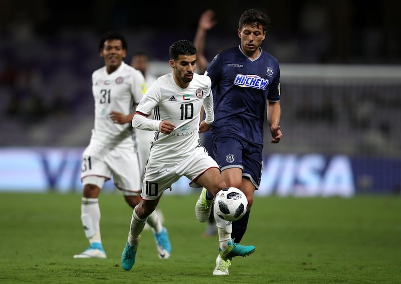 AL AIN, UNITED ARAB EMIRATES - DECEMBER 06: Mbark Boussoufa of Al-Jazira is challenged by Darren White of Auckland City FC during the FIFA Club World Cup UAE 2017 play off match between Al Jazira and Auckland City FC at on December 6, 2017 in Al Ain, United Arab Emirates.  (Photo by Francois Nel/Getty Images)