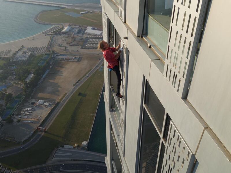 French climber Alain Robert, popularly known as ‘Spiderman,’ rehearsing his upcoming Cayan ‘Twisted’ tower climb in Dubai Marina in December 2014. Courtesy Alain Robert
