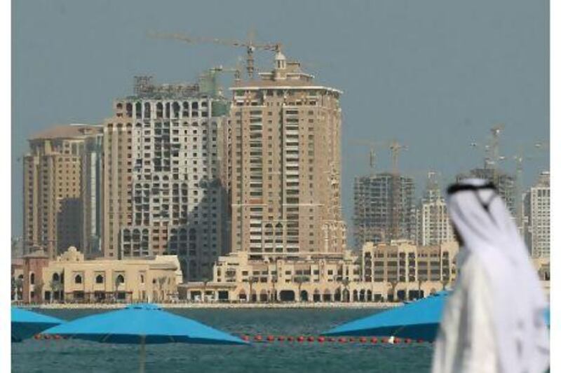 The Pearl Qatar, a man-made island on Doha's West Bay, is the first place in Qatar where foreigners are allowed to own property. Sean Gallup / Getty Images