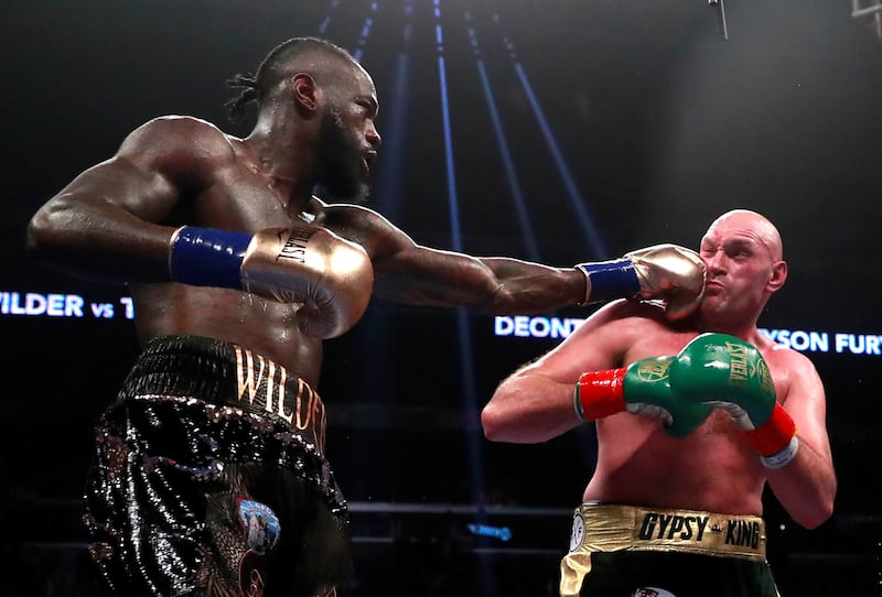 Boxing - Deontay Wilder v Tyson Fury - WBC World Heavyweight Title - Staples Centre, Los Angeles, United States - December 1, 2018  Deontay Wilder in action against Tyson Fury  Action Images via Reuters/Andrew Couldridge