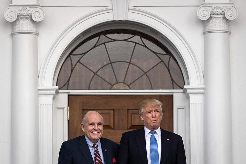 Former New York City mayor Rudy Giuliani, left, and president-elect Donald Trump on November 20, 2016 in Bedminster Township, New Jersey.  Drew Angerer / Getty Images / AFP, file