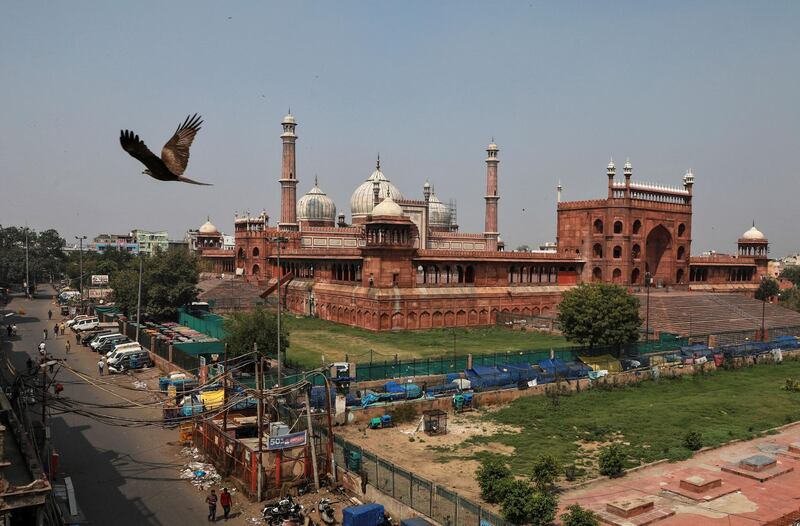 A nearly empty road is seen next to Jama Masjid (Grand Mosque) during a 14-hour long curfew to limit the spreading of coronavirus disease. Reuters