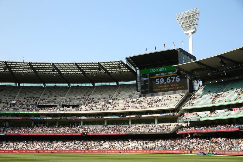 The scoreboard at the MCG shows the crowd attendance on Friday. Getty Images