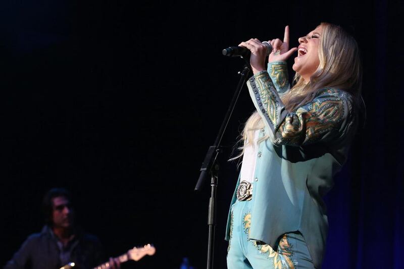 Kesha performs at Dylan Fest. Laura Roberts / Invision / AP.