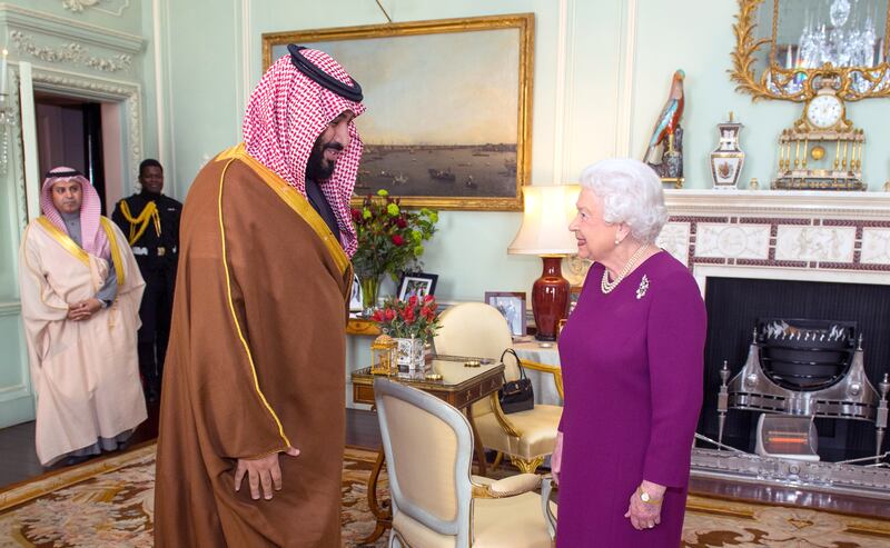 Queen Elizabeth greets Crown Prince Mohammed bin Salman of Saudi Arabia during a private audience at Buckingham Palace in March 2018. Getty Images