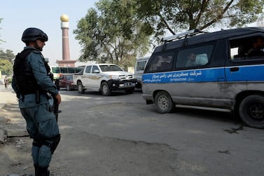An Afghan policeman keeps watch at a checkpoint near the US embassy in Kabul. AFP