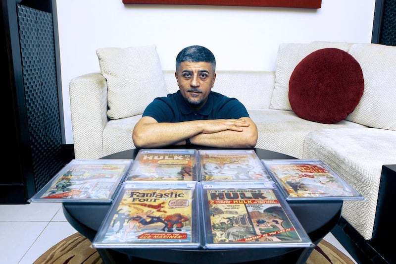 Peter Georgiou with his rare collection of Comics from Fantastic Four to the Hulk. Jeffrey E Biteng / The National