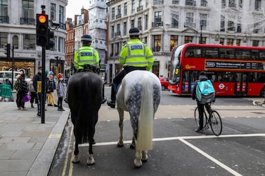 Mounted police and a Deliveroo rider wait at a red light at Regent Street,. Deliveroo, which was founded by in the capital in 2013, said it will use the dual class share structure for its IPO. Reuters