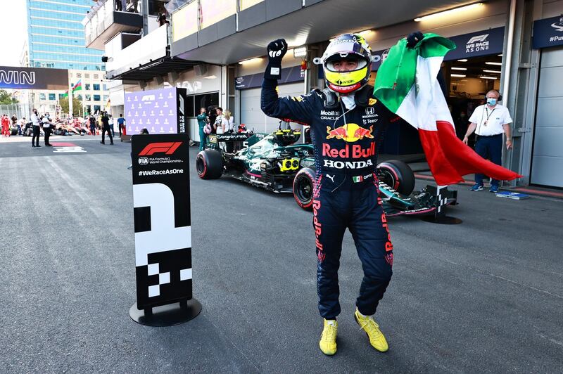 Rud Bull driver Sergio Perez celebrates after winning the Azerbaijan Grand Prix in Baku on Sunday, June 6. Getty