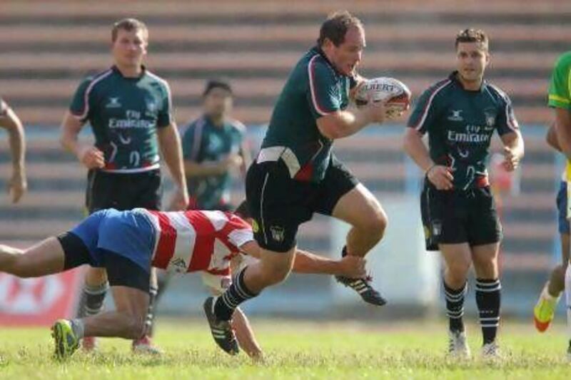 Byron Kraemer, centre, shined in the team's 21-12 loss to Kazakhstan at the Borneo Sevens.