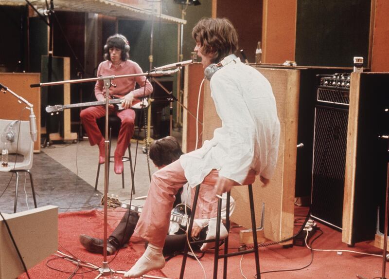 1968:  Bill Wyman, Keith Richards and Mick Jagger of the Rolling Stones recording their hit 'Sympathy For The Devil'.  (Photo by Hulton Archive/Getty Images)