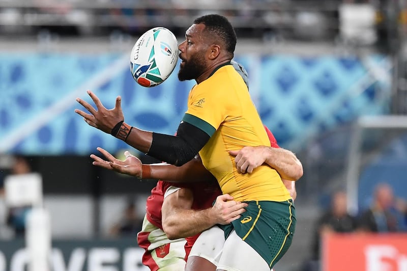 Australia centre Samu Kerevi attempts to catch the ball. AFP