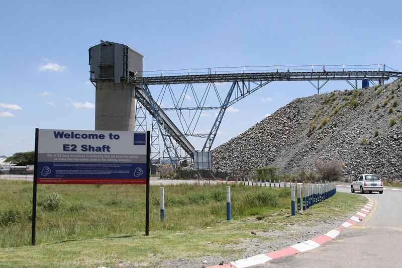 A sign welcomes visitors to the E2 shaft mining area at the Marikana platinum mine, operated by Lonmin, in Marikana. Dean Hutton / Bloomberg News