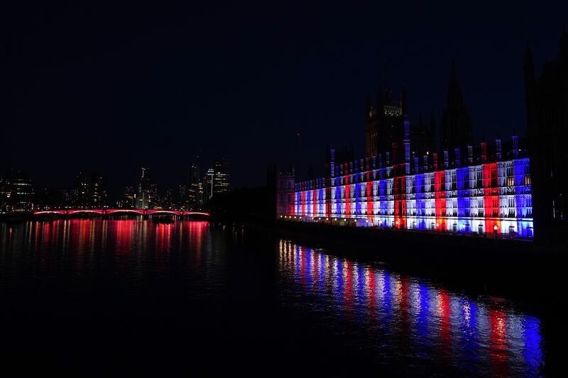 Another view of the Palace of Westminster, and Lambeth Bridge, lit up for the Coronation of King Charles and Queen Camilla on May 07. Getty