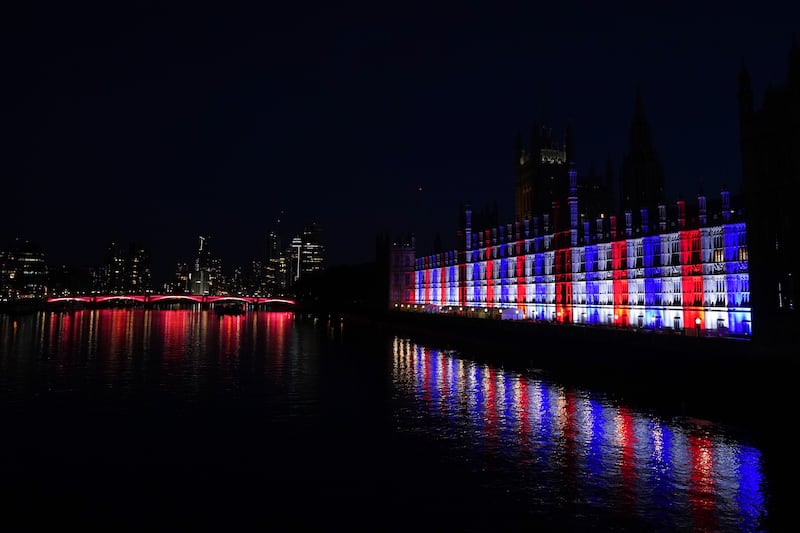 Another view of the Palace of Westminster, and Lambeth Bridge, lit up for the Coronation of King Charles and Queen Camilla on May 07. Getty