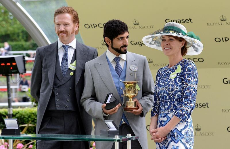 ASCOT, ENGLAND - JUNE 16:  Actors Damian Lewis and wife Helen McCrory present The Coventry Stakes trophy to Sheikh Hamdan Bin Mohammed Al Maktoum during Royal Ascot 2015 at Ascot racecourse on June 16, 2015 in Ascot, England.  (Photo by Kirstin Sinclair/Getty Images for Ascot Racecourse)