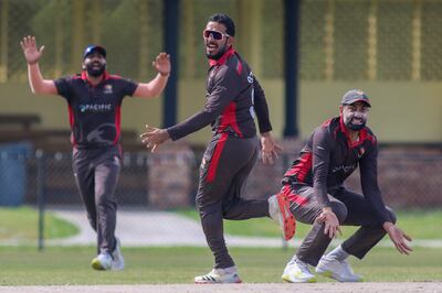 Muhammad Waseem, CP Rizwan and Ahmed Raza react with frustration after the UAE's appeal against Scotland captain Kyle Coetzer is turned down. Photo: USA Cricket