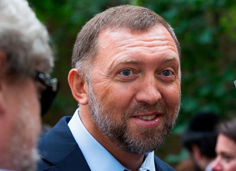 FILE- In this file photo taken on Thursday, July 2, 2015, Russian metals magnate Oleg Deripaska attends Independence Day celebrations at Spaso House, the residence of the American Ambassador, in Moscow, Russia.  Sanctions announced Friday April 6, 2018, are targeting 17 Russian government officials and seven Russian oligarchs, including Deripaska, who is being targeted with more comprehensive U.S. sanctions according to officials.(AP Photo/Alexander Zemlianichenko, File)
