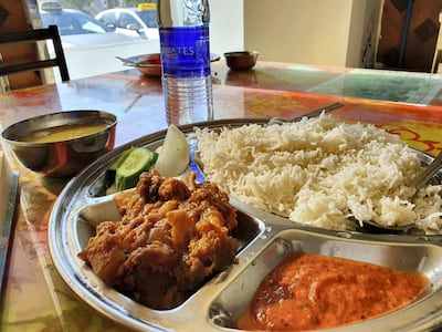 Image of food including chicken, chutney and rice at Tasty Zone Cafeteria in Abu Dhabi. Rob McKenzie for The National