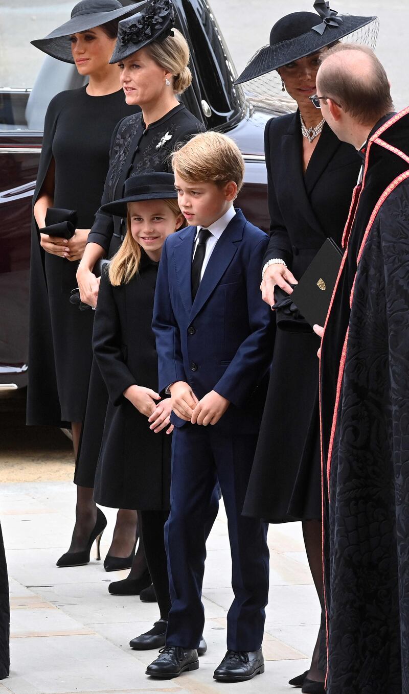 The Prince and Princess of Wales's oldest two children, Prince George, 9, and Princess Charlotte, 7, attend the funeral. AFP