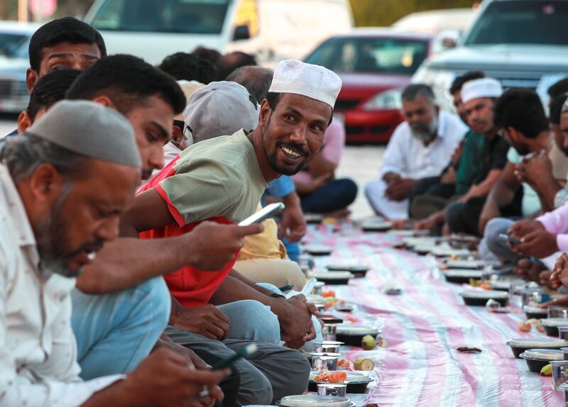Those fasting await the call to break their fast at Mary Mother of Jesus Mosque. Victor Besa / The National