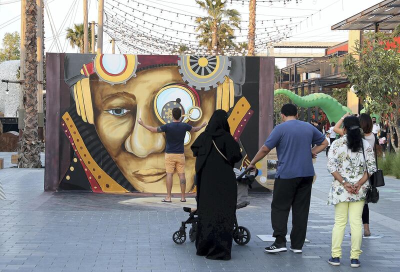 DUBAI , UNITED ARAB EMIRATES , MARCH 6  – 2018 :- People taking photos with 3D art work by Shawn McCann artist from USA at the Dubai Canvas held at La Mer in Dubai. ( Pawan Singh / The National ) For Arts & Life / Big Picture