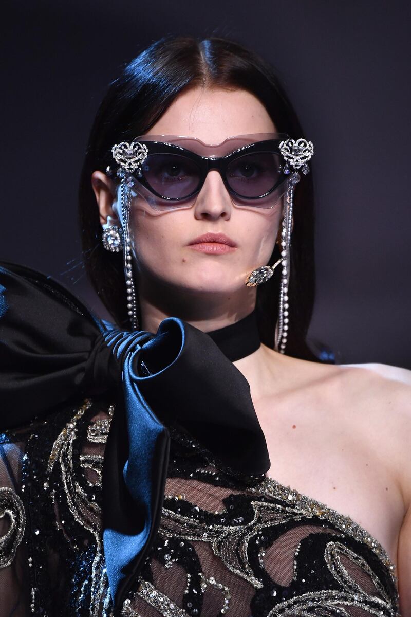 PARIS, FRANCE - JANUARY 24:  A model, sunglasses detail, walks the runway during the Elie Saab Spring Summer 2018 show as part of Paris Fashion Week on January 24, 2018 in Paris, France.  (Photo by Pascal Le Segretain/Getty Images)