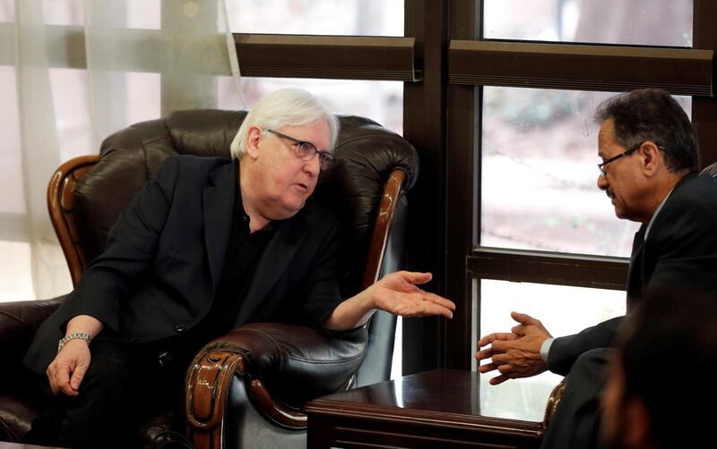 FILE PHOTO: U.N. envoy to Yemen Martin Griffiths talks to the undersecretary of Houthi-led government's foreign ministry, Faisal Amin Abu-Rass upon his arrival at Sanaa airport in Sanaa, Yemen June 16, 2018. REUTERS/Khaled Abdullah/File Photo