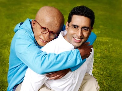 Bachchan, left, and his son Abhishek Bachchan starred together in Paa. Photo: Amitabh Bachchan Corporation
