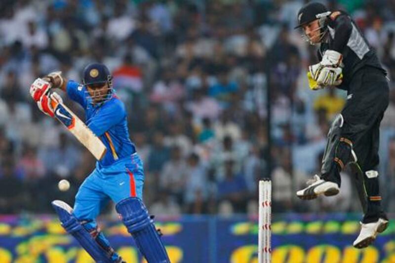 Parthiv Patel plays a shot as New Zealand’s wicketkeeper Brendon McCullum watches during India’s victory yesterday. The hosts won the series 5-0.