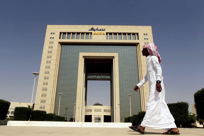 A man walks past the headquarters of Saudi Basic Industries Corp (SABIC) in Riyadh, Saudi Arabia October 27, 2013. REUTERS/Faisal Al Nasser/File Photo - S1BETCBZGRAB