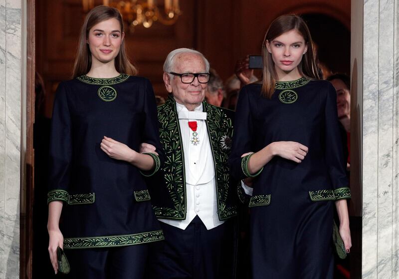 Pierre Cardin acknowledges applause after a show to mark 70 years of his creations, in Paris in November 2016. AP