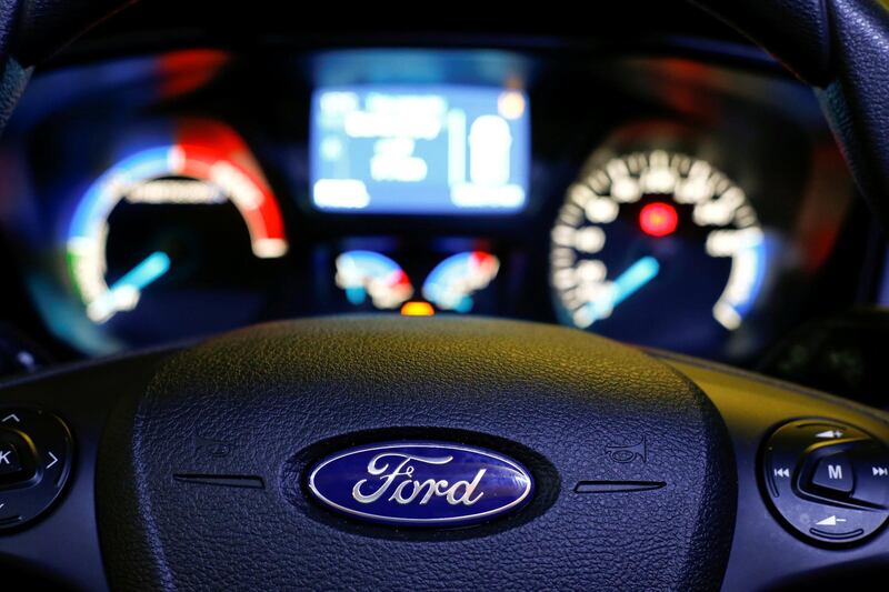 FILE PHOTO: The cockpit and steering wheel of a Streetscooter WORK XL electric van based on a Ford Transit is pictured at Ford's new production line in Cologne, Germany October 9, 2018. REUTERS/Wolfgang Rattay/File Photo