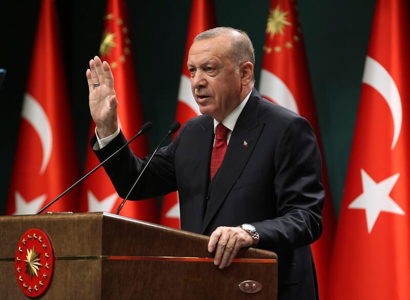 Turkey's President Recep Tayyip Erdogan, talks in a televised address, following a cabinet meeting, in Ankara, Turkey, Monday, Sept. 21, 2020. Erdogan, who has long called for a reform of the United Nations, says the world body has failed in its response to the coronavirus pandemic. Erdogan claimed the UN was late in "accepting the existence" of the pandemic and had failed to "make its presence felt" for nations requiring help to fight infections. (Turkish Presidency via AP, Pool)