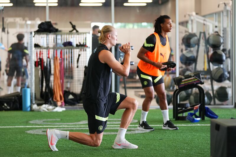 Erling Haaland works out in the gym.