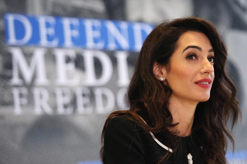 epa07486545 Lebanese-British barrister Amal Clooney delivers a statement to media in the margins of the G7 Foreign Ministers Meeting in Dinard, France, 05 April 2019. The gathering of Foreign Ministers in Dinard and Saint Malo on 05 and 06 April 2019 takes place ahead of the G7 Summit in Biarritz, from 25 to 27 August 2019.  EPA/THIBAULT VANDERMERSCH