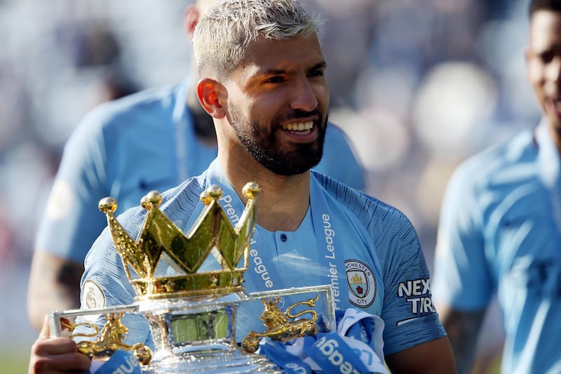 Manchester City striker Sergio Aguero celebrates after beating Brighton 4-1 at the Amex Stadium to be crowned Premier League champions. Getty Images