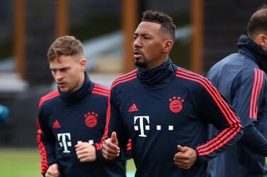 Soccer Football - Champions League - Bayern Munich Training - Saebener Strasse, Munich, Germany - February 24, 2020 Bayern Munich's Jerome Boateng and Joshua Kimmich during training REUTERS/Michael Dalder