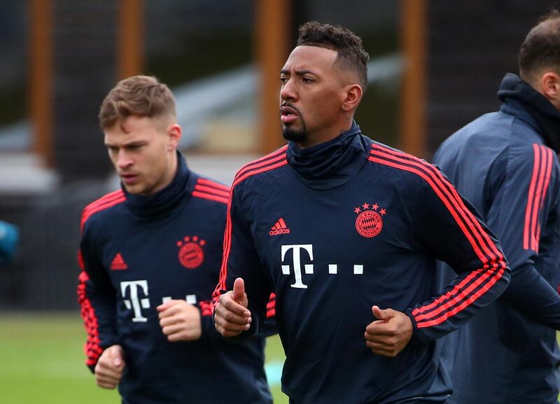 Soccer Football - Champions League - Bayern Munich Training - Saebener Strasse, Munich, Germany - February 24, 2020   Bayern Munich's Jerome Boateng and Joshua Kimmich during training   REUTERS/Michael Dalder