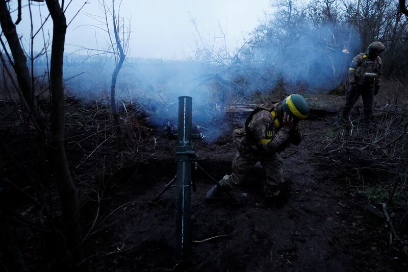 Ukrainian mortar crews fire on Russian lines in Donetsk. Reuters
