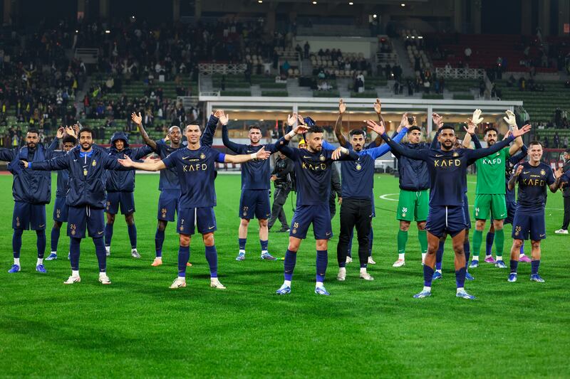 Cristiano Ronaldo and his Al Nassr teammates celebrate in front ot the fans. Getty Images